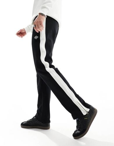 Joggers neri con spacco sul fondo - The Couture Club - Modalova