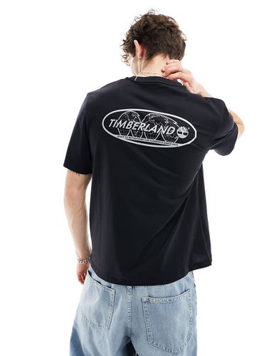 T-shirt nera con stampa riflettente del logo sul retro - Timberland - Modalova