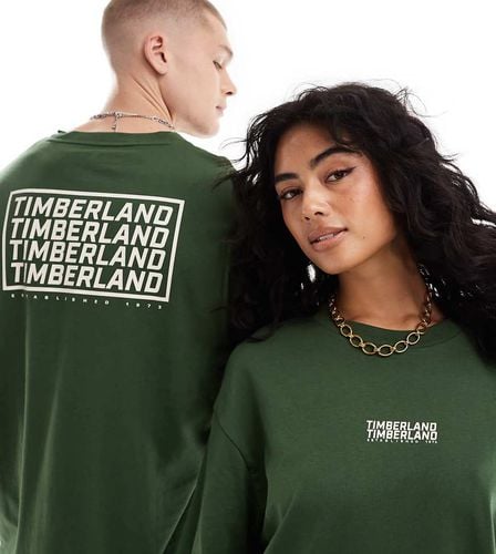 T-shirt oversize scuro con logo ripetuto - In esclusiva per ASOS - Timberland - Modalova