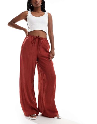 Pantaloni a fondo ampio color ruggine testurizzato con coulisse in vita - Vero Moda - Modalova