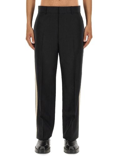 Palm angels pants with logo band - palm angels - Modalova