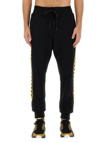 Jogging pants "chain" - versace jeans couture - Modalova