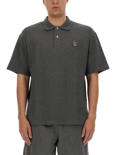 Maison kitsuné polo with logo - maison kitsuné - Modalova