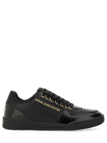 Sneaker with logo - versace jeans couture - Modalova