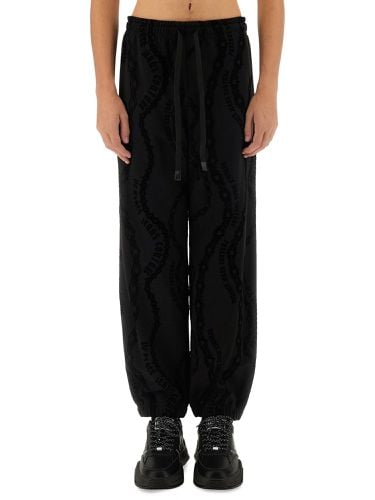 All over "chain" jogging pants - versace jeans couture - Modalova