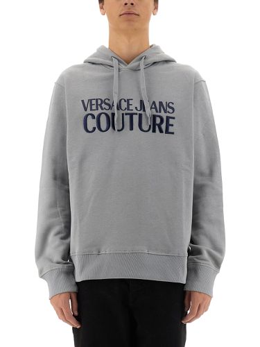 Sweatshirt with logo - versace jeans couture - Modalova