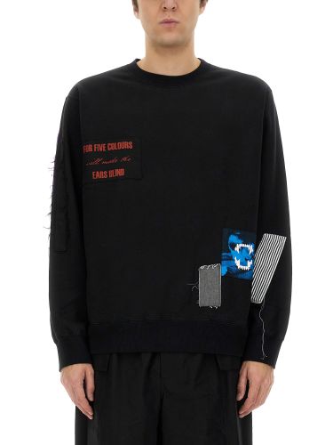 Undercover sweatshirt with patches - undercover - Modalova