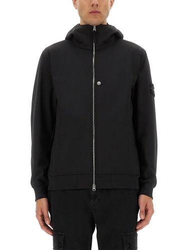 Lightweight hooded jacket - stone island - Modalova
