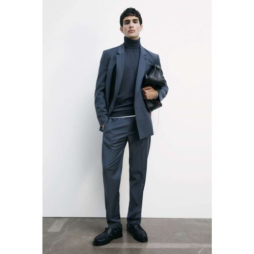 Rollkragenpullover aus feiner Wolle - leicht, wärmend und atmungsaktiv zugleich. Vielseitiges Essential, das jeden Look perfektioniert. Der schmale F - 8058701544110 - Modalova