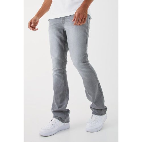 Jeans a zampa Slim Fit in denim rigido - boohoo - Modalova