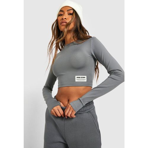 Crop top Active Gym a maniche lunghe con etichetta intessuta - boohoo - Modalova