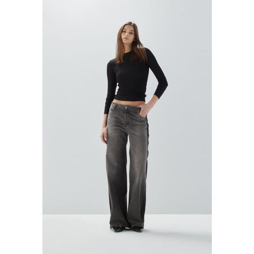 Jeans flare con bande laterali a contrasto - Please - Modalova