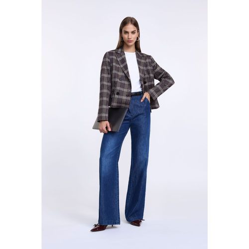 Jeans flare con piega stirata - Please - Modalova