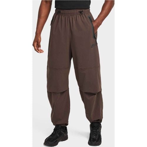 Tech Woven Oversized Trousers - Nike - Modalova