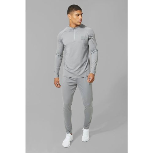 Tuta sportiva Man Active Skinny Fit a girocollo con zip corta - boohoo - Modalova