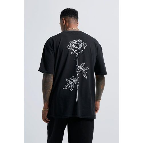 T-shirt con stampa di rose e stelo disegnato a linee - boohoo - Modalova