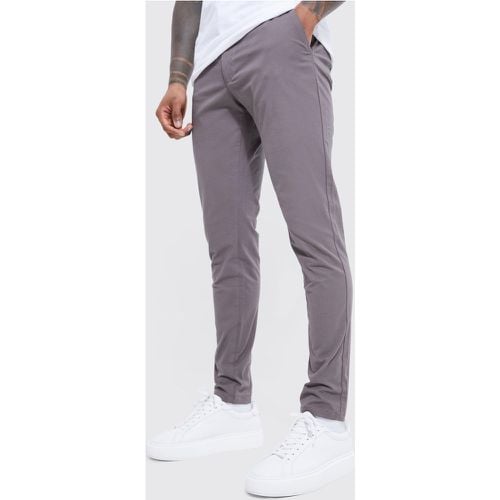 Pantaloni Chino Skinny Fit con trama e vita fissa - boohoo - Modalova