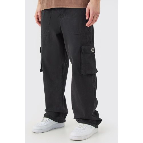 Pantaloni Cargo a vita fissa con zip ed etichetta in gomma - boohoo - Modalova