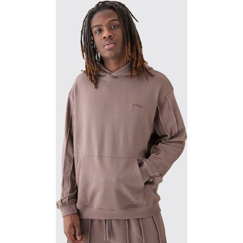 Felpa oversize con ricamo di firma Man, cuciture grezze e cappuccio - boohoo - Modalova