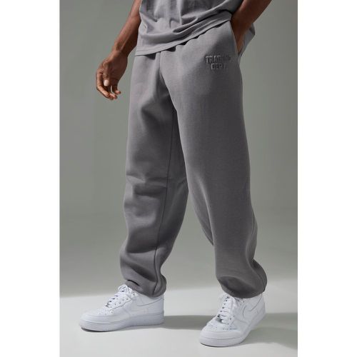 Pantaloni tuta oversize Man Active Training Dept - boohoo - Modalova