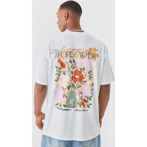 T-shirt oversize con stampa Worldwide a fiori - boohoo - Modalova