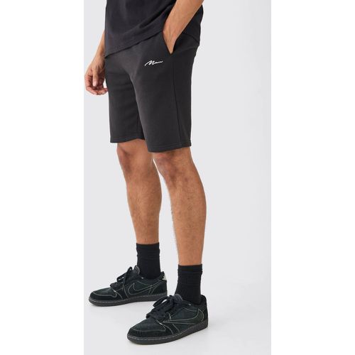 Pantaloncini medi comodi con firma Man - boohoo - Modalova