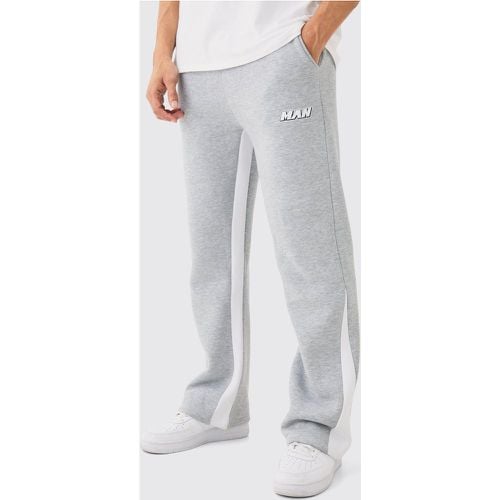 Pantaloni tuta Man con cuciture a contrasto e inserti - boohoo - Modalova