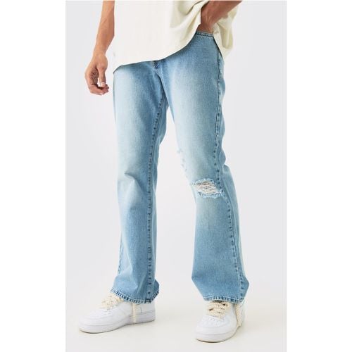Jeans rilassati in denim rigido slavato con strappi sul ginocchio - boohoo - Modalova