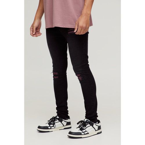 Jeans da Biker Super Skinny Fit in Stretch viola con strappi & rattoppi - boohoo - Modalova