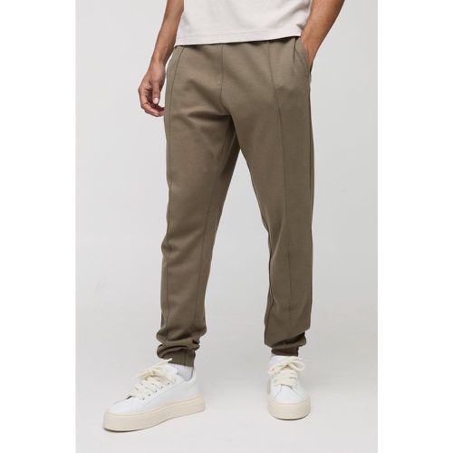 Pantaloni tuta Slim Fit affusolati pesanti Super Clean in maglia interlock - boohoo - Modalova