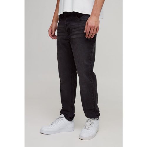 Jeans Slim Fit in denim rigido color antracite - boohoo - Modalova