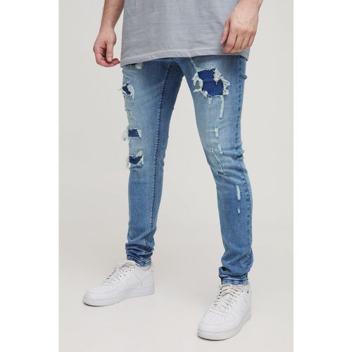 Jeans Tall Skinny Fit super smagliati in lavaggio sporco - boohoo - Modalova