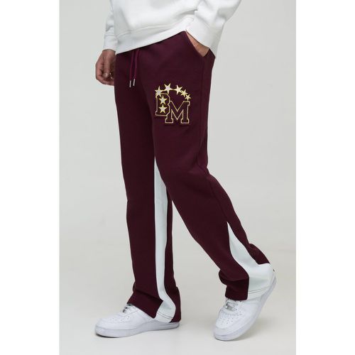 Pantaloni tuta BM stile Varsity con applique e inserti - boohoo - Modalova