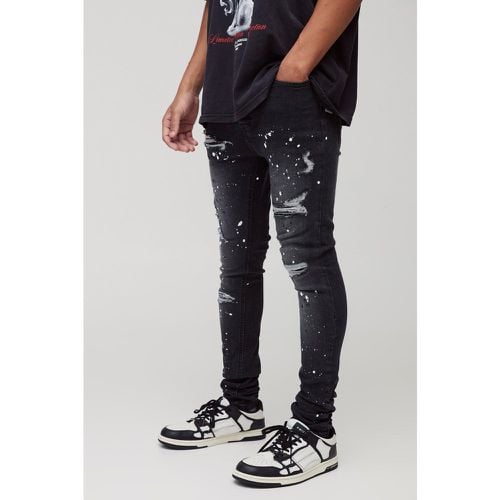 Jeans Super Skinny Fit con strappi & rattoppi e schizzi di colore - boohoo - Modalova