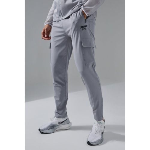 Pantaloni tuta Cargo in tessuto Stretch Man Active Training Dept - boohoo - Modalova