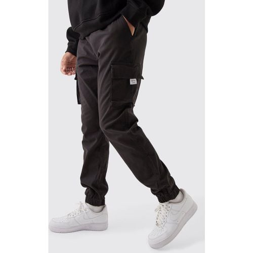 Pantaloni Cargo Slim Fit con vita elasticizzata e polsini alle caviglie - boohoo - Modalova