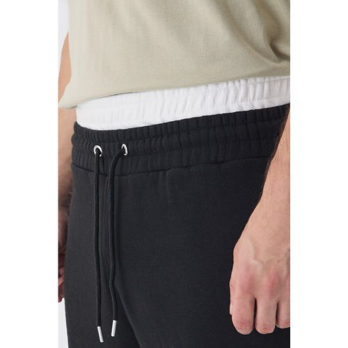 Pantaloni neri Tall extra comodi in jersey con doppia fascia in vita - boohoo - Modalova