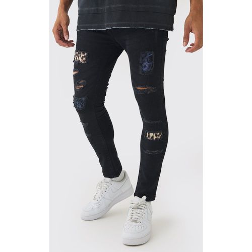 Jeans Skinny Fit leopardati in fantasia cachemire con strappi & rattoppi - boohoo - Modalova