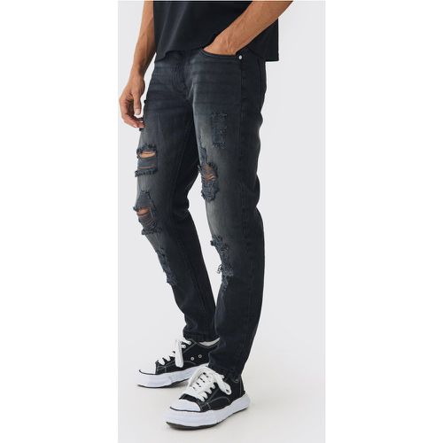 Jeans Slim Fit strappati, Nero - boohoo - Modalova