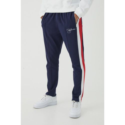 Pantaloni tuta affusolati Slim Fit con pannelli in piqué e ricamo man - boohoo - Modalova