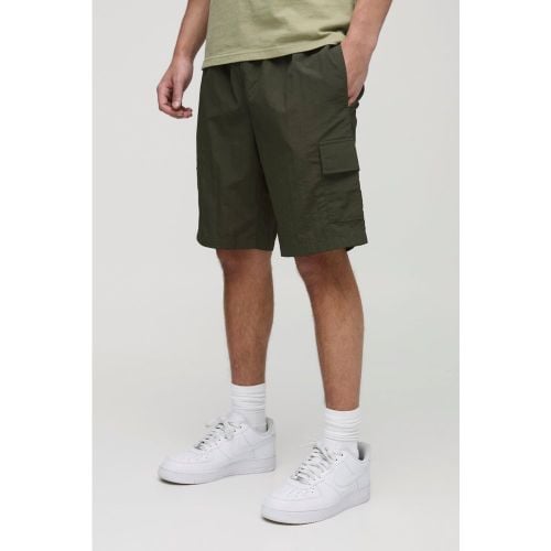 Pantaloncini Cargo medi rilassati in nylon effetto goffrato con vita elasticizzata - boohoo - Modalova