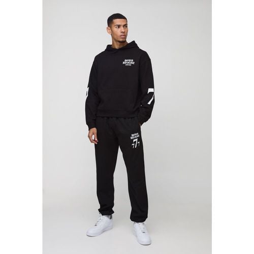 Tuta sportiva squadrata oversize con stampa 7 e cappuccio - boohoo - Modalova