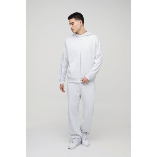 UOMO. Set felpa Basic leggera con zip e cappuccio & pantaloni tuta dritti - boohoo - Modalova