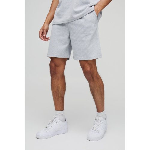 Pantaloncini rilassati con ricamo Man e trama a nido d'ape - boohoo - Modalova