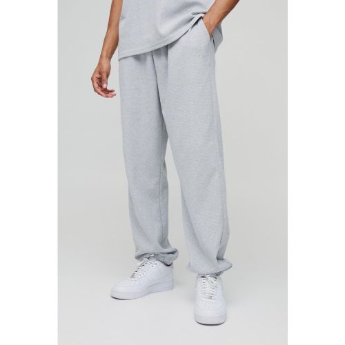 Pantalón Deportivo Oversize Man De Tela Gofre Con Botamanga Y Bordado - boohoo - Modalova