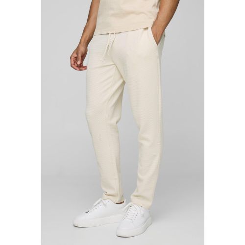 Cropped Tapered Textured Jogger - boohoo - Modalova