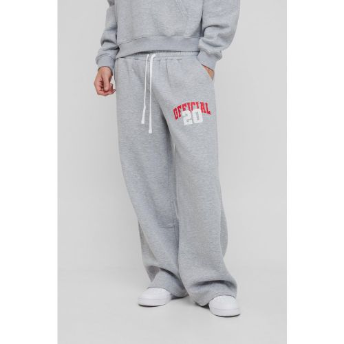 Pantaloni tuta a gamba ampia stile Varsity con doppia fascia in vita - boohoo - Modalova