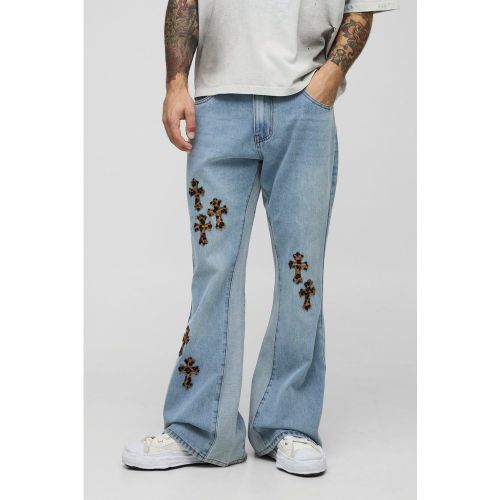 Vaqueros Holgados De Campana Con Apliques De Leopardo Y Refuerzos Cruzados - boohoo - Modalova