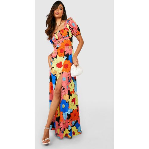 Vestito maxi a fiori in colori accesi con maniche a sbuffo - boohoo - Modalova