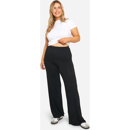 Pantaloni a gamba ampia Plus Size Basic in jersey - boohoo - Modalova